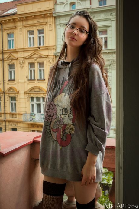 Perfect teen Adeline removes her glasses and lingerie to pose nude in stockings