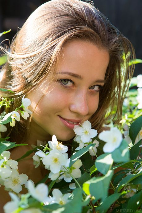 Amazing babe Taissia A strikes great nude poses in a forest