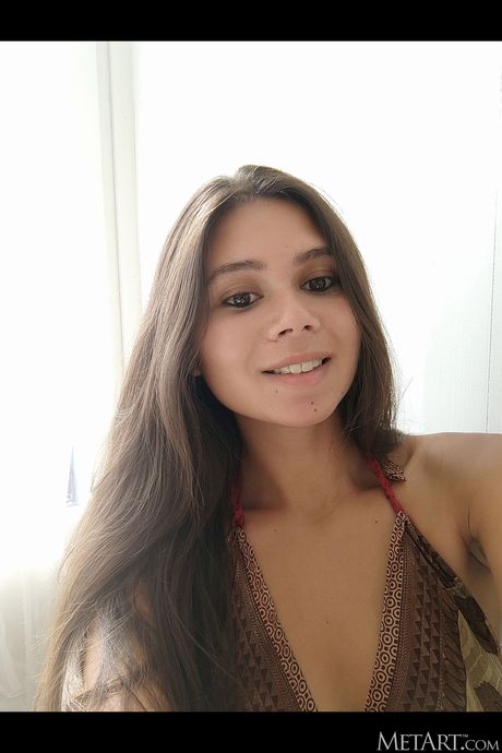 Sexy French teen Savana takes selfies before getting naked and wet in the shower