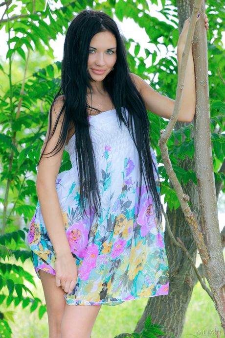 Skinny teen Kitti A strips & bares it all in the forest