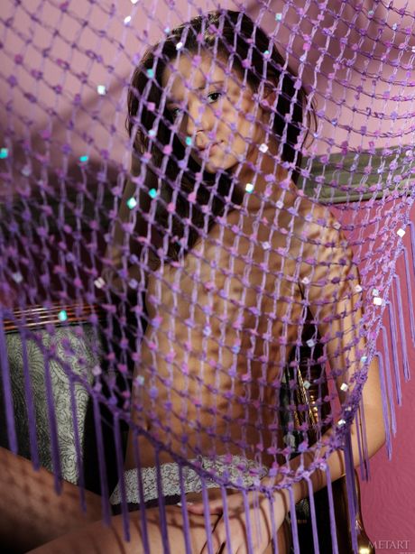 Brunette teen Irina J gets nude in a confident fashion