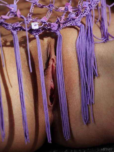 Brunette teen Irina J gets nude in a confident fashion