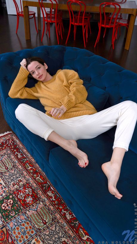 Blonde teen Ana Moloko takes off her clothes and panties to pose nude