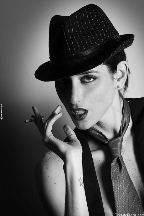 Slender teen Nadia gets naked in a pair of high heels in a sexy manner