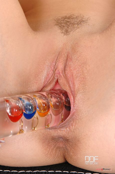 Hungarian babe Cayenne Klein shows her perfect butt and toys her pussy