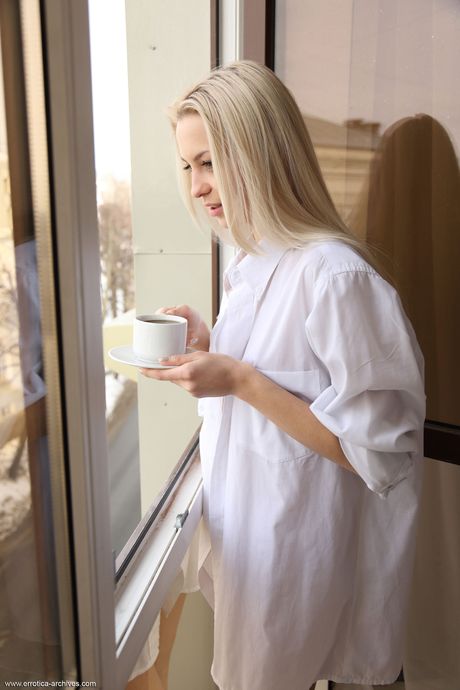 Delightful teen Leonie removes a bikini to get totally naked with conviction