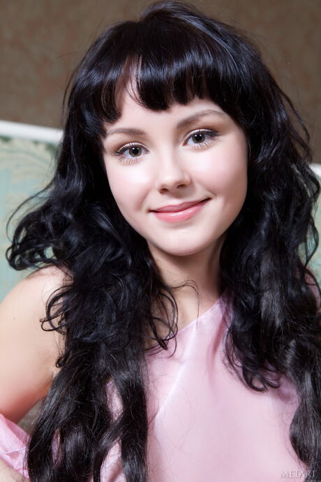 18 year old girl Mirelle A removes her bra and panties to pose nude