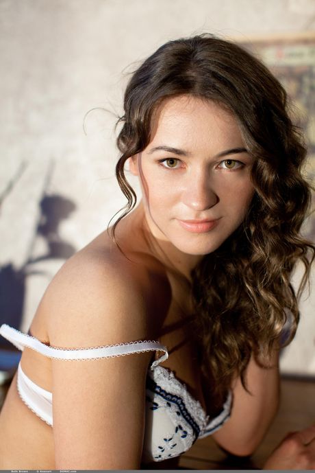 Brunette teen Beth Brown removes black lingerie for great nude poses