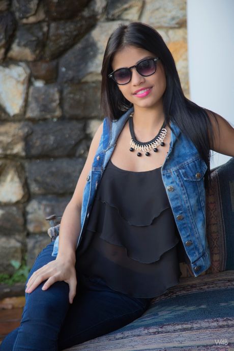 Venezuelan teen Denisse Gomez strips and poses on the patio