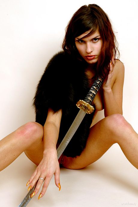 Erotic Beauty: Natural redhead Karina highlights her bald pussy while totally naked