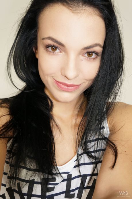 Slender teen Sapphira takes selfies while getting naked in front of a mirror