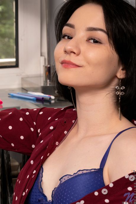 Cute teen Candy Black strips off her lingerie before touching her pussy