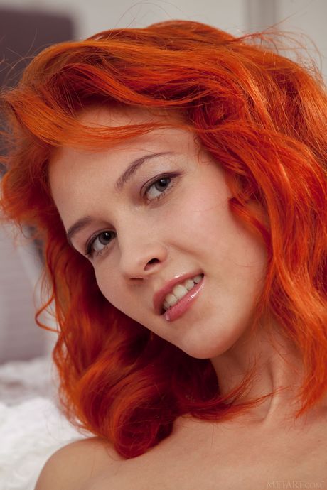 Ambre takes off her bikini and presents her big boobs and sexy ass