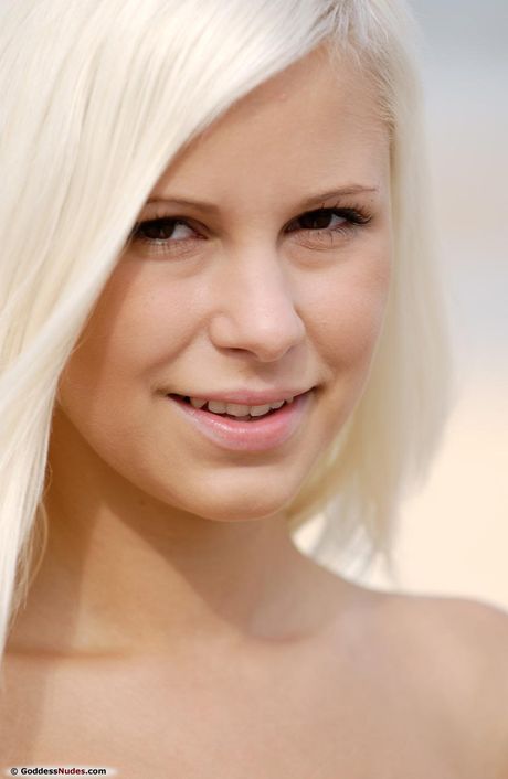 Pretty teen Dido A gets naked on a blanket in the middle of a forest