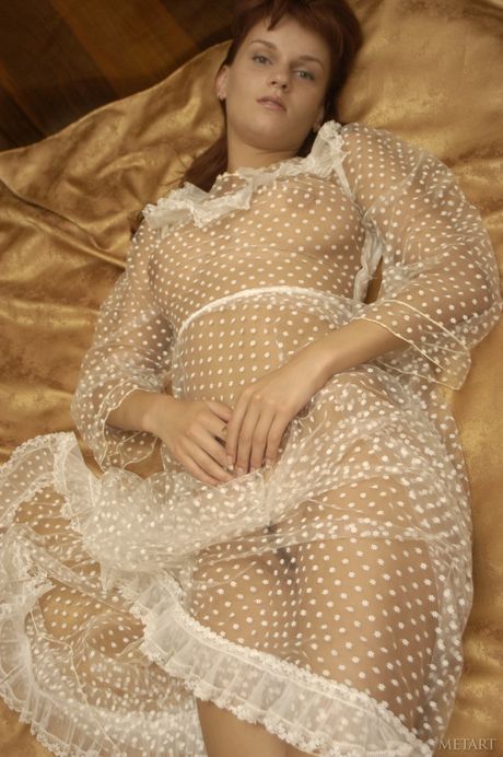 Svelte teen girl Natasha Orcanikova removes her lingerie to pose nude