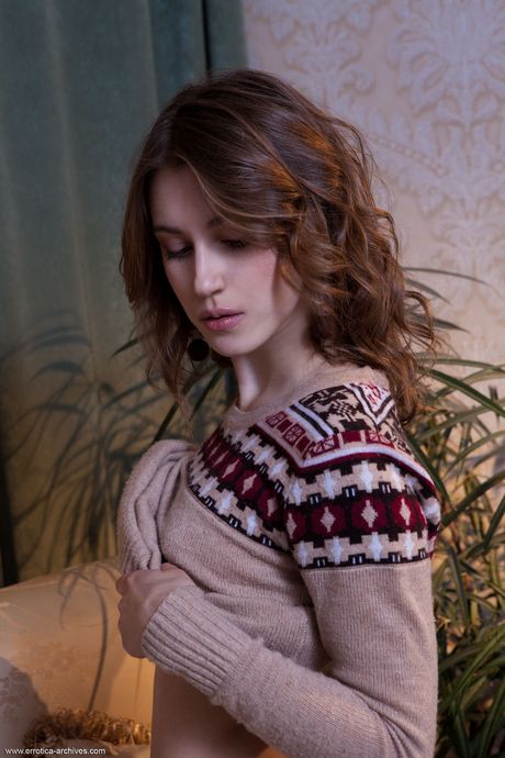 Ukrainian belle Arlett strips and exposes her small tits and bald pussy