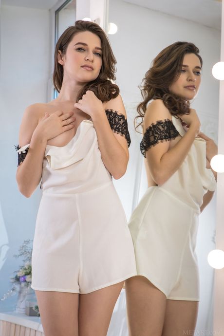 Pretty teen Serena Wood gets completely naked in front of a mirror