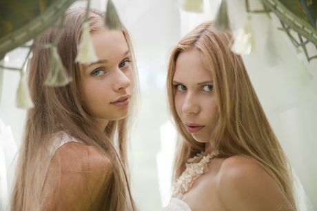 Teen lesbians Alisa Bri & Milena D kiss before licking pussies in the forest
