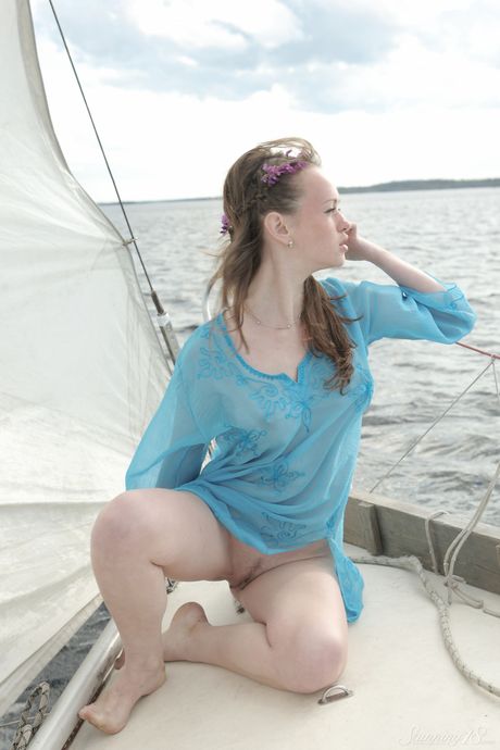 Charming teen Vega goes nude on a sailboat in the ocean