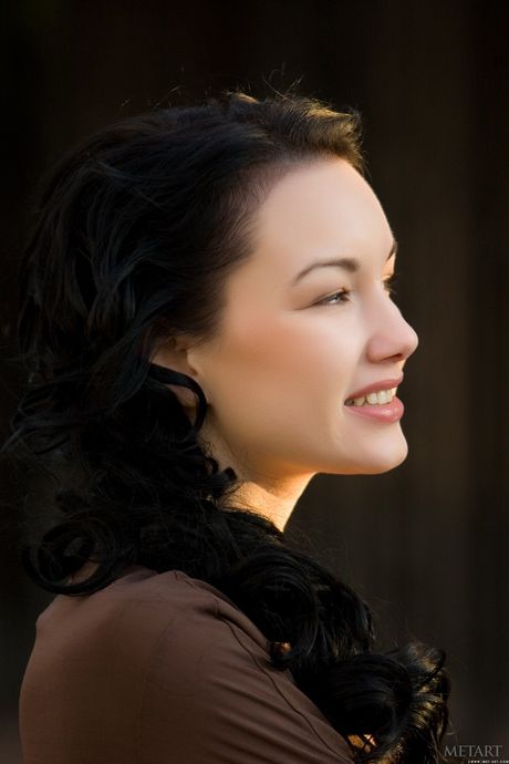 Sexy brunette Loreen A gets naked in a public place and reveals her big tits