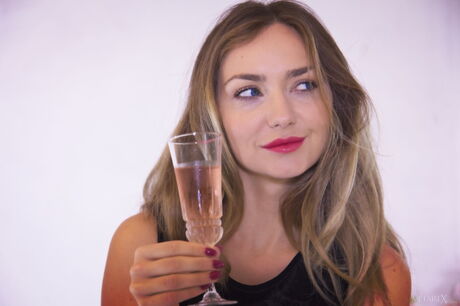 Victoria Puppy takes off her sexy lingerie and stockings and gets into the bathtub