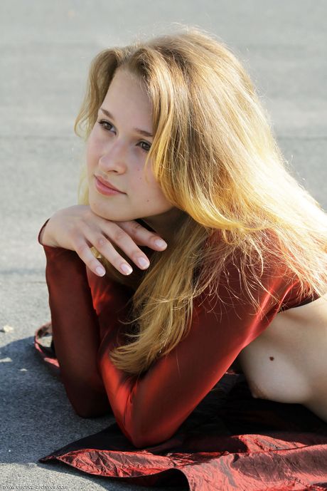 Sexy amateur teen Angela strips and poses naked in high heels outdoors