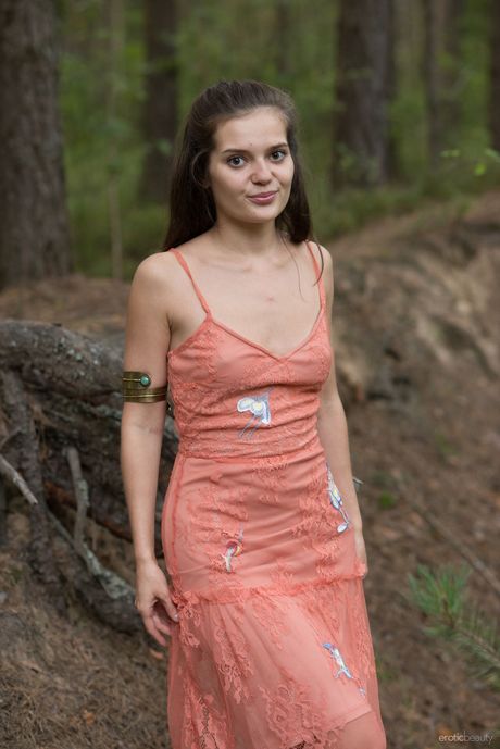 Sexy Ukrainian Pola strips naked in the forest and shows her tiny tits