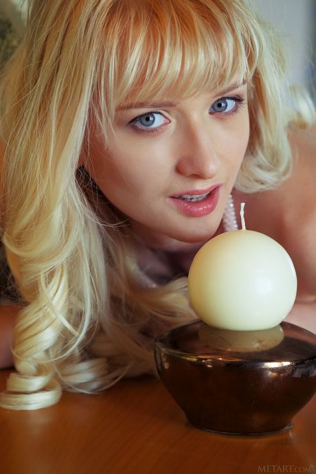 Blonde teen Nika N models totally naked without embarrassment