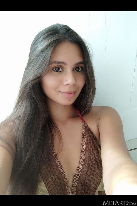 Charming teen Savana takes selfies before getting naked in a bathroom