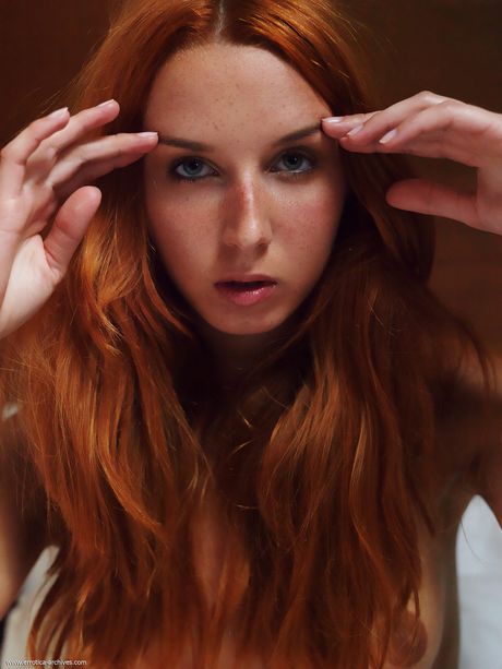 Lean teen Fiamma shows her small tits and bald pussy in the nude