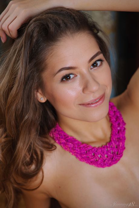 Busty teen Cassandra gets naked in a bathtub while washing her big tits