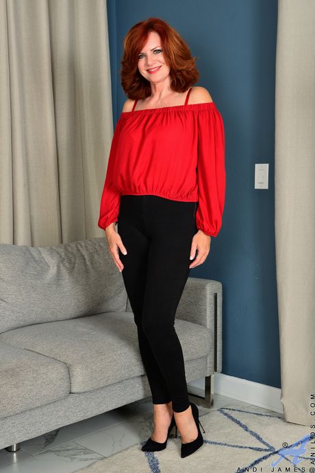 Redheaded MILF Andi James shows her hairy pussy in high heels