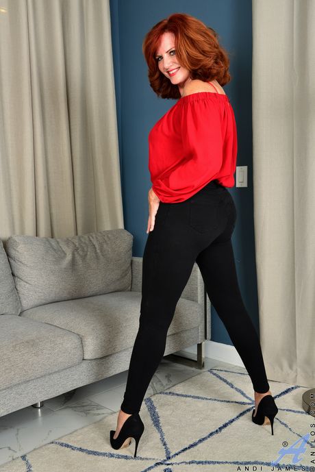 Redheaded MILF Andi James shows her hairy pussy in high heels