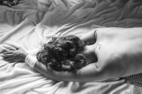 Nurse Jacinta B strips to her uniform and ties her hands behind her back