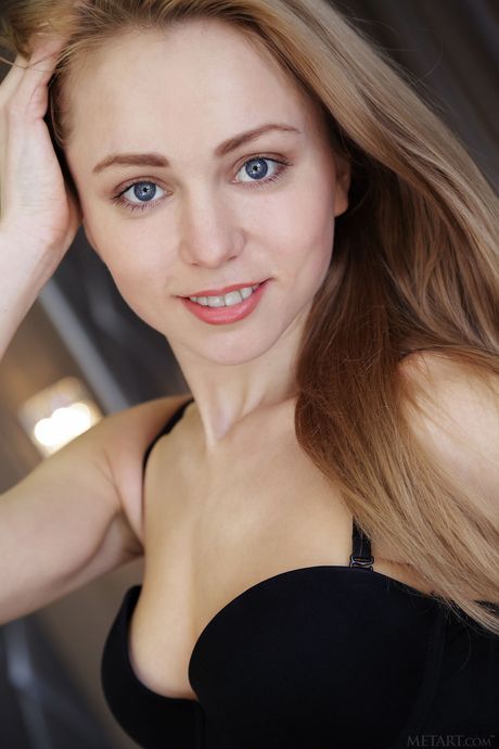 Skinny blonde teen Lenayna gets naked and presents her tiny tits and twat