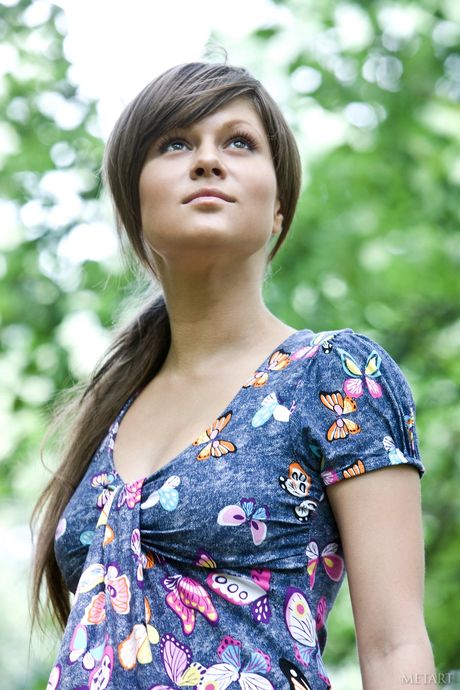 Slender teen Taira A removes her bikini to pose nude