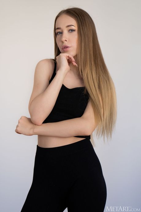 Nata Ocean enticingly strips off her yoga pants and exhibits her sexy body