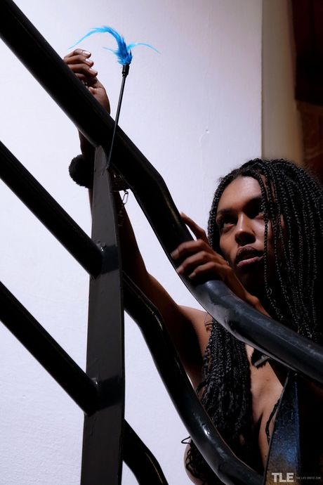 Ebony teen Samantha A removes her braided pigtails before masturbating