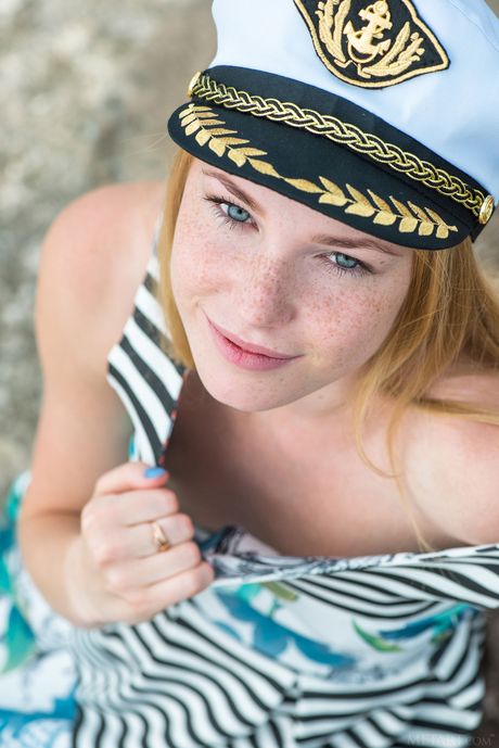 Hot blonde Runa strips naked on the rocks to show her tiny tits & bald pussy