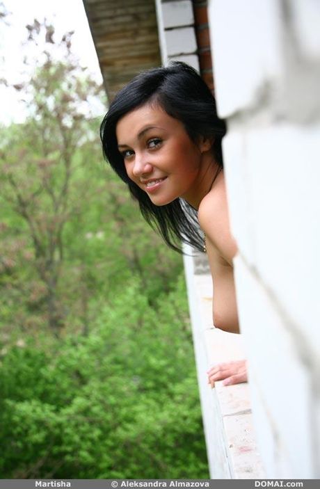 Skinny teen Martisha shows her small tits and poses nude in a solo