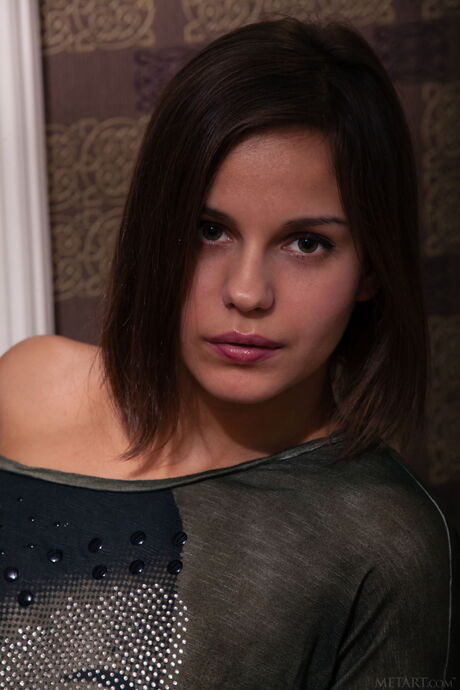 Lean teen Tirata shows her big tits and poses in stockings