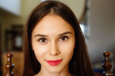 Delicate teen Leona Mia shows her tiny tits and ass while posing nude