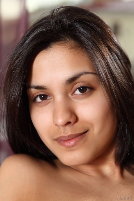 Ukrainian venus Belinda A removes her bikini and poses nude