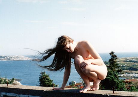 Glamorous teen Ronin posing naked on the beach & showing her big tits