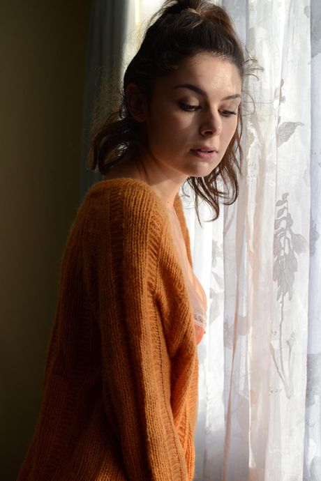 Slender teen Anney gets naked in stockings and shows her hairy pussy