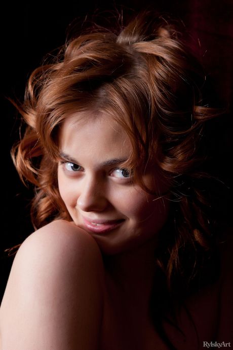 Endearing teen Amy removes her stockings to get totally naked in a bedroom