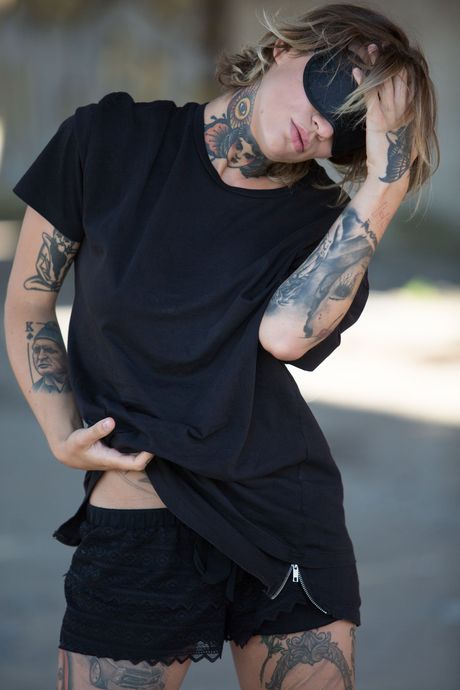 Stacy Cloud strips outdoors and exposes her tattooed body