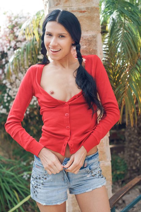 Ukrainian lady Alecto strips to her socks and fingers her pussy outdoors