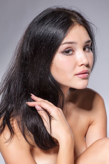 Gorgeous teen Malena Fendi strikes great nude poses in a pair of heels