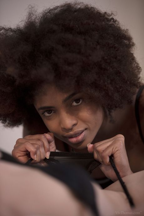 Teen lesbians Luna Corazon & Liona Levi kiss after pleasuring pussies on a bed